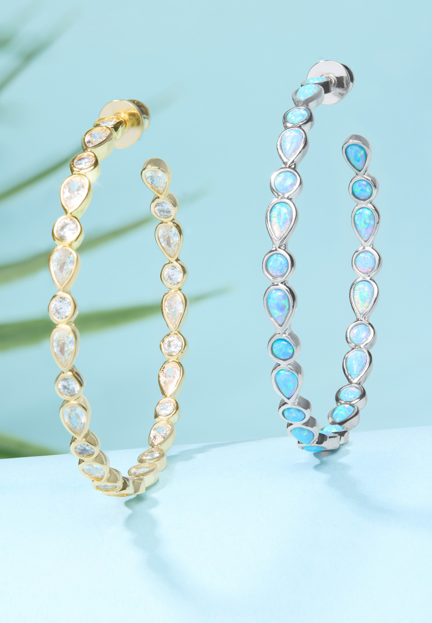 NEW Isla Hoops 2" on blue background