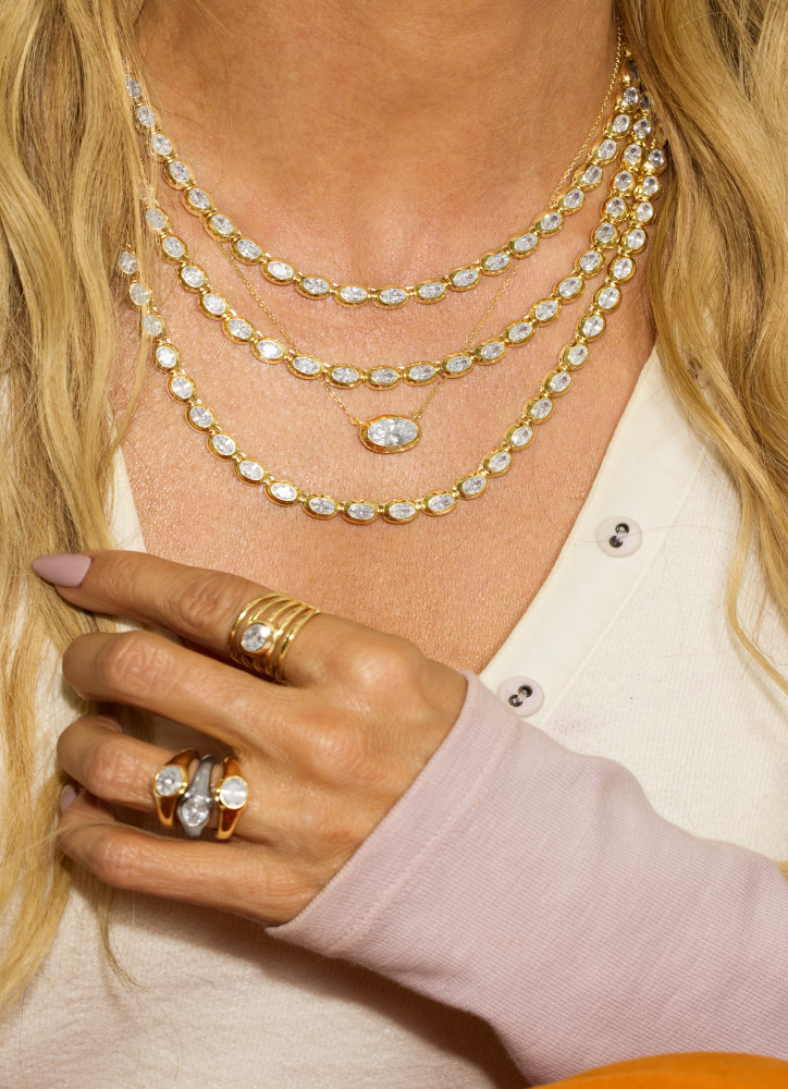 Melinda wearing the NEW She's a Boss collection necklaces and rings