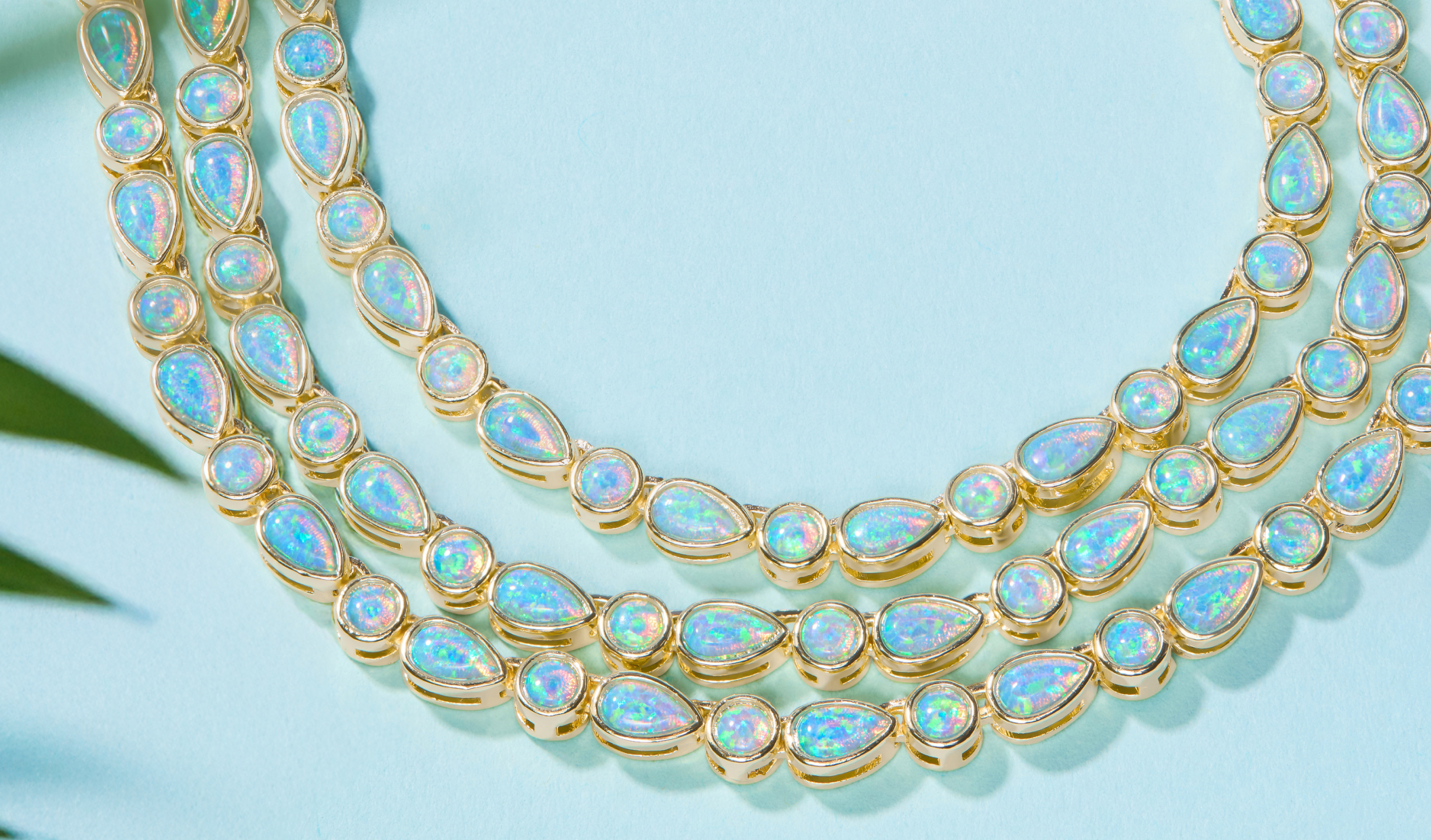 NEW Isla Tennis Necklace in Blue Opal on blue background