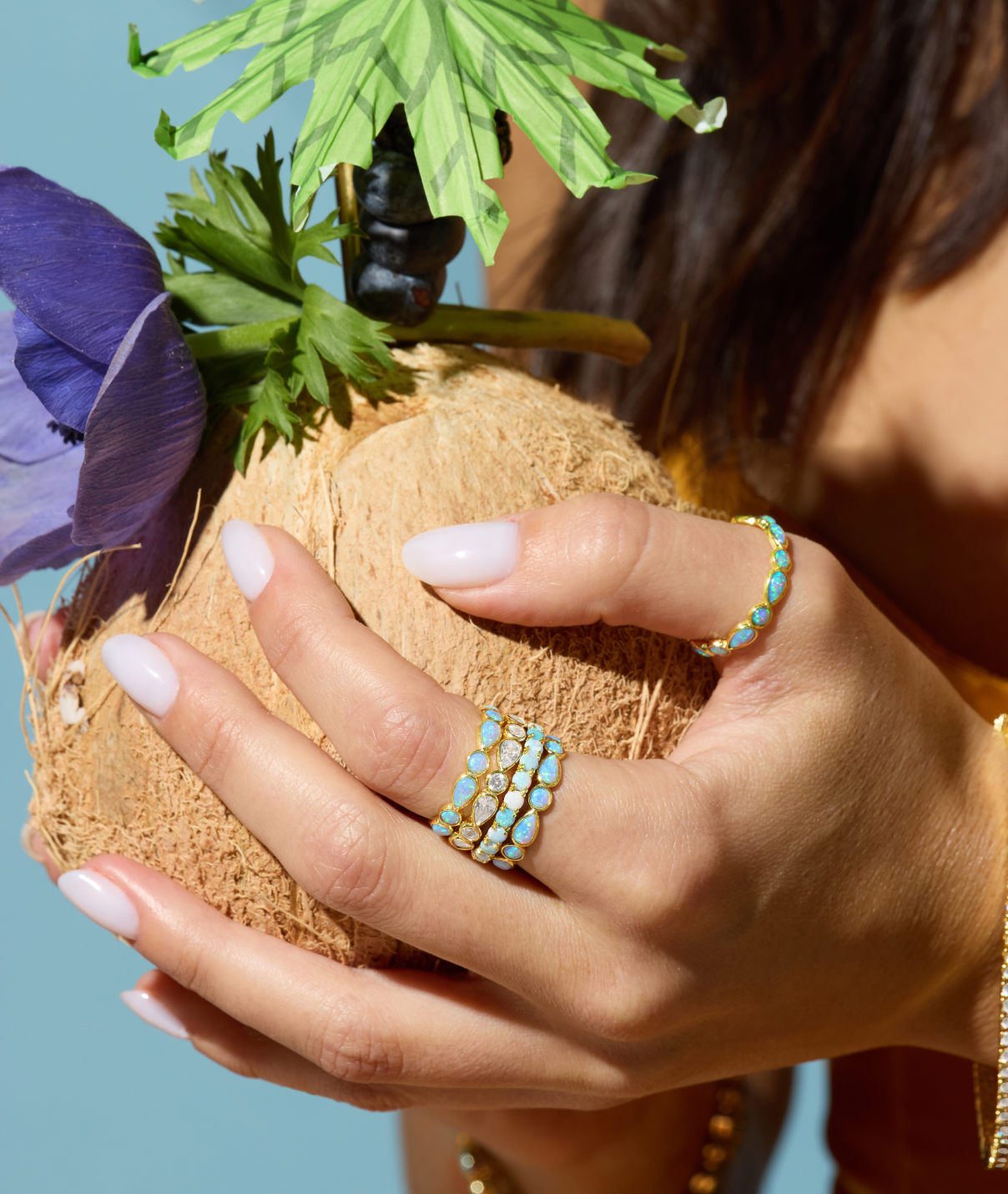 Closeup of model's hand wearing the NEW Isla Rings