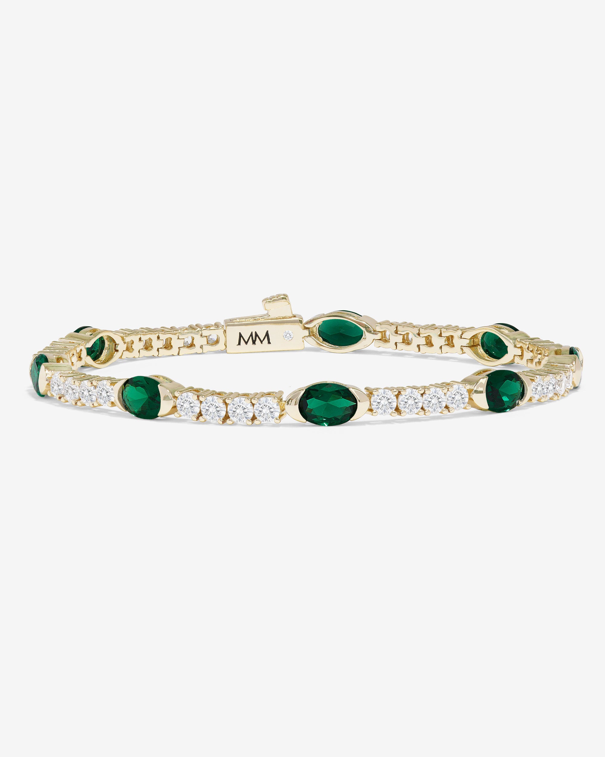 The Maven Gold Tennis Bracelet with Simulated Emeralds – Melinda