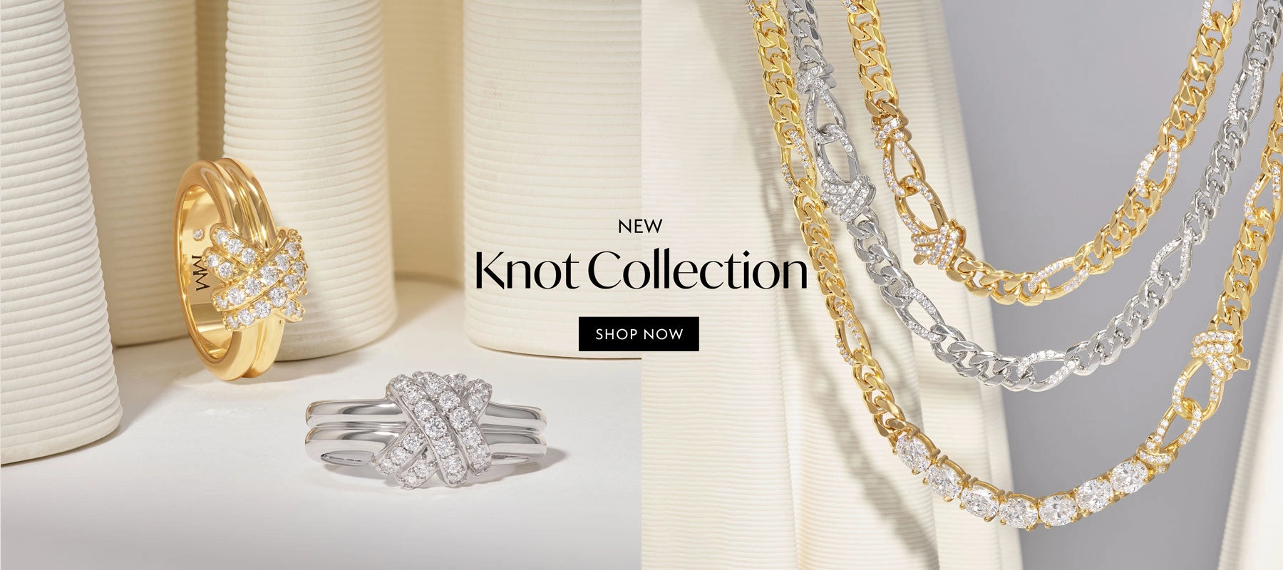 A jewelry display featuring multiple gold and silver chain necklaces draped over white cylindrical stands, with two rings on the left. The center contains the text 'NEW Knot Collection' and a black 'SHOP NOW' button.