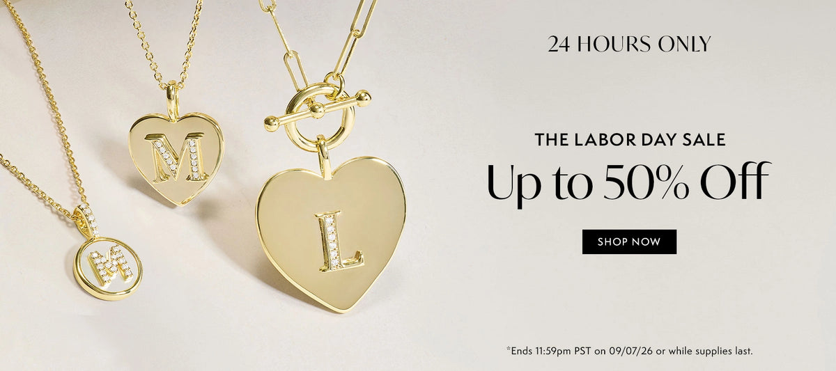 Three gold initial pendant necklaces with letters M, L, and a small circular initial pendant are displayed on a light beige background next to promotional text for a Labor Day sale.