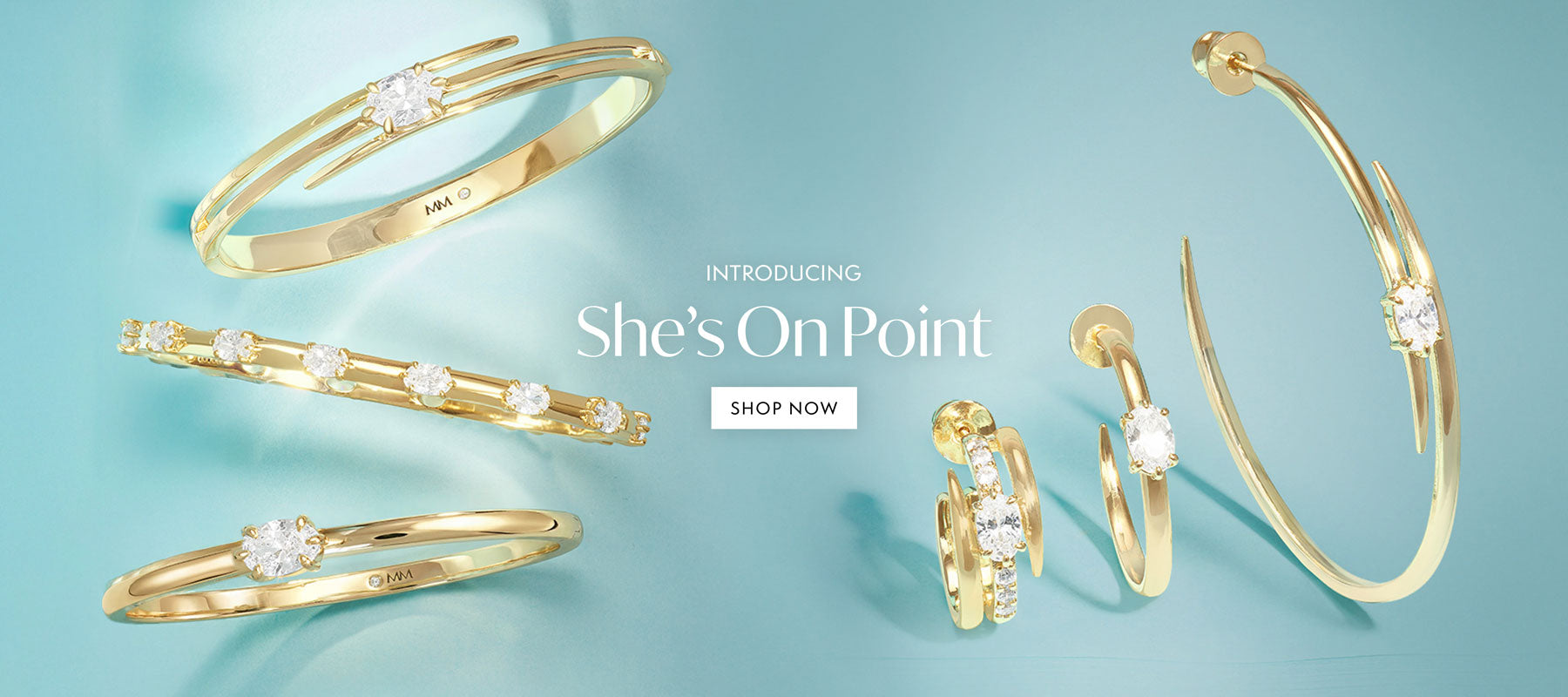 Gold jewelry set including bracelets and earrings on a light blue background with 'She's On Point' branding.
