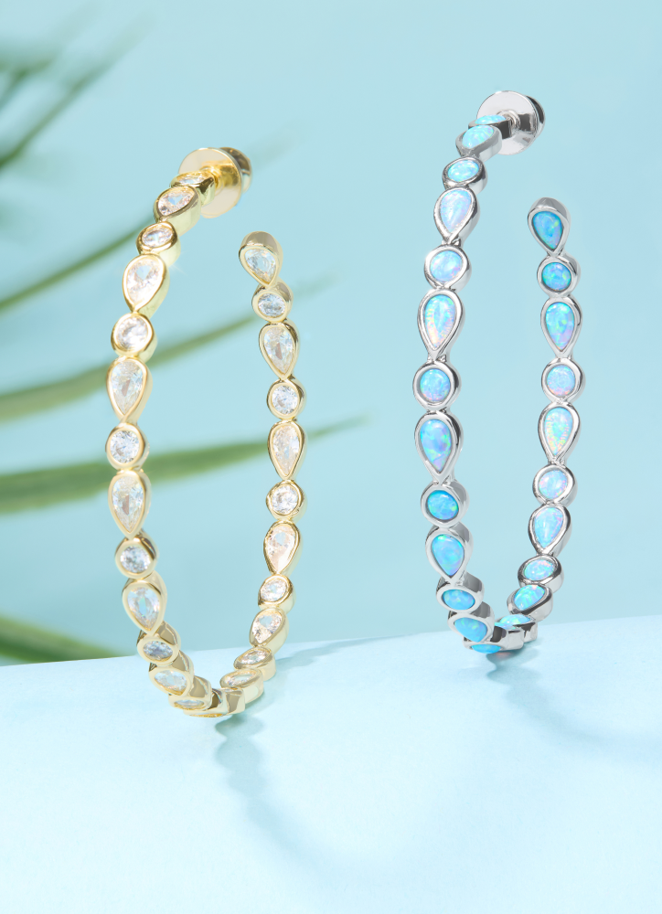 NEW Isla Hoops 2" on a blue background