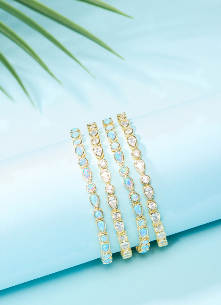 NEW Isla Tennis Bracelets on a blue background